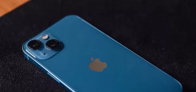 a blue iphone on the table