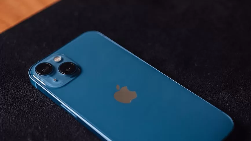 a blue iphone on the table