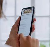 person holding black android smartphone