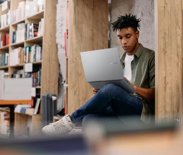 African,American,Student,E learning,On,Laptop,During,A,Research,In