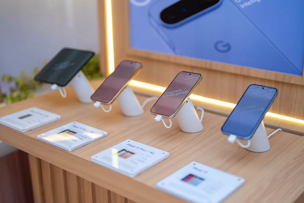 The Google Pixel 11 series on display, inviting visitors to explore the devices and experience Gemini Intelligence first hand.(1)